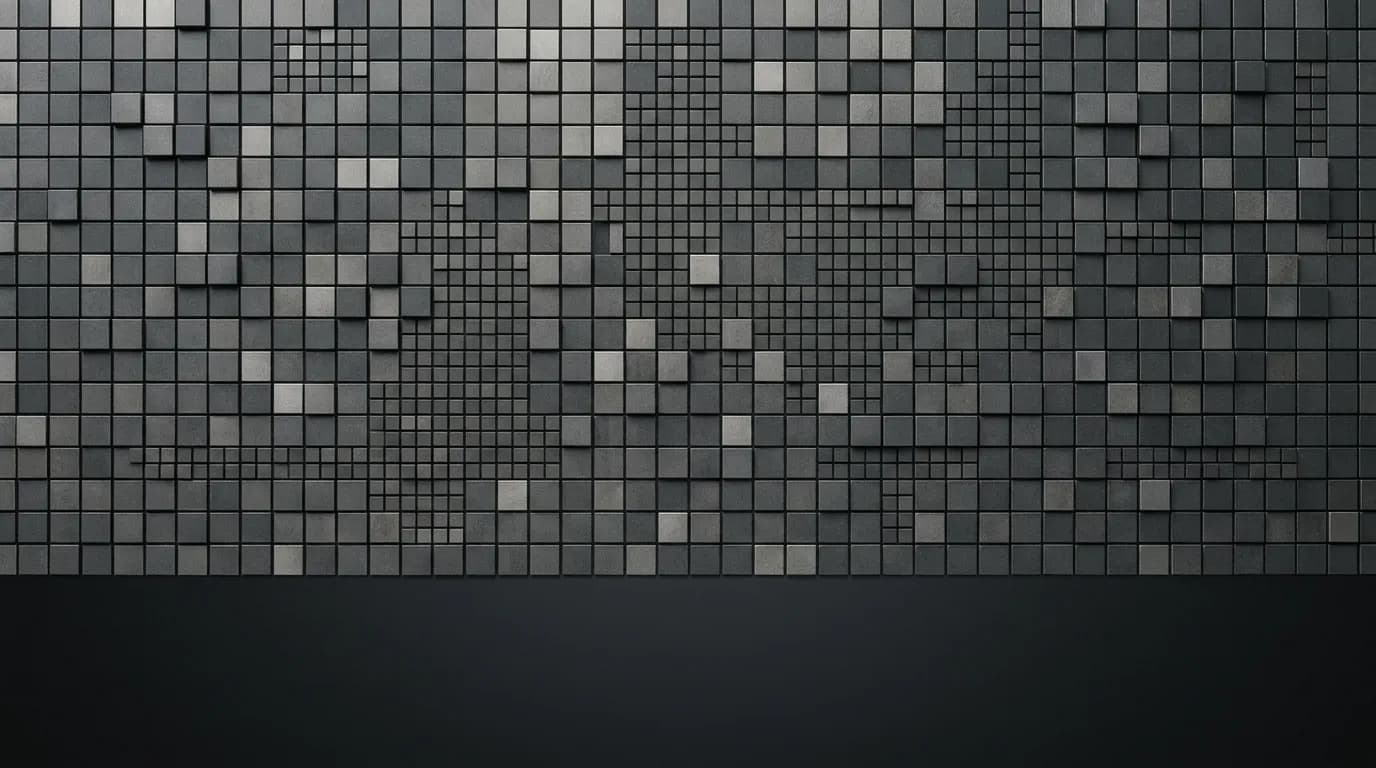 Abstraktní geometrický vzor čtvercových dlaždic v šedých tónech připomínající architekturu procesoru.